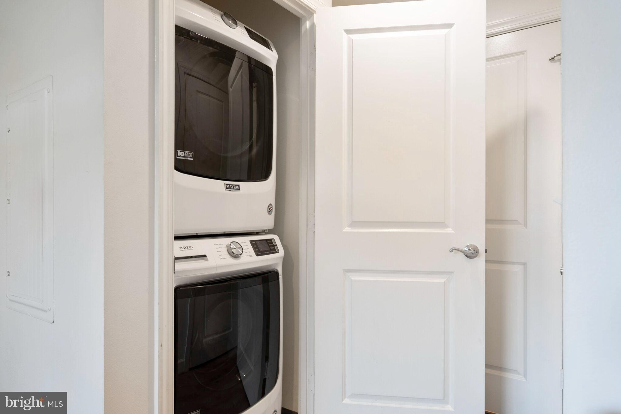 3650 South Glebe Road, Unit 450 Arlington, VA 22202 - Photo 23 of 60 a utility room with dryer and washer