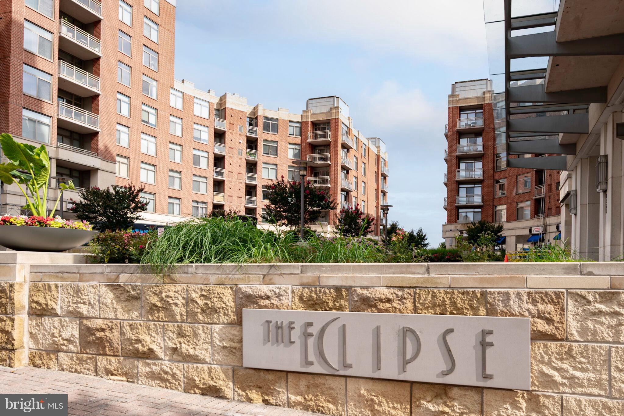 3650 South Glebe Road, Unit 450 Arlington, VA 22202 - Photo 3 of 60 a street sign on a brick wall