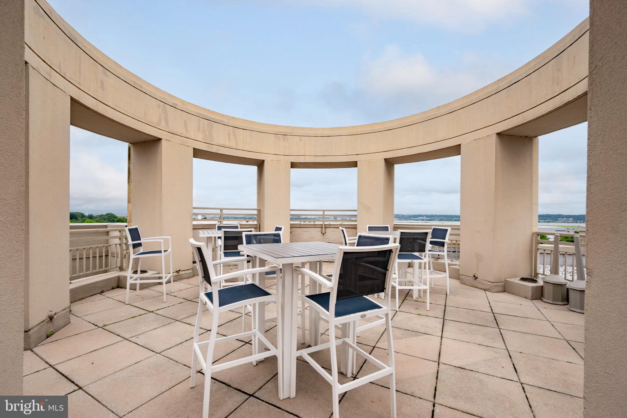 3650 South Glebe Road, Unit 450 Arlington, VA 22202 - Photo 35 of 60 a view of a dining room with furniture window and outside view