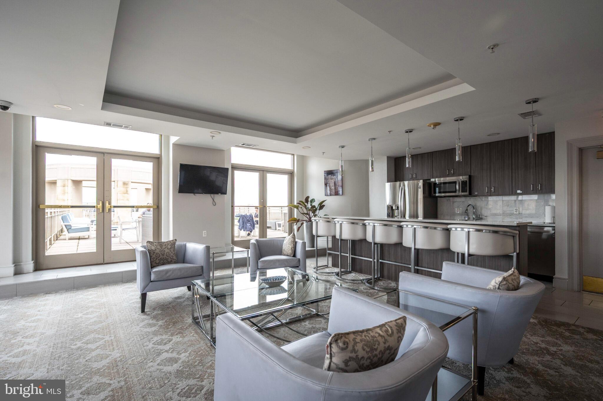 3650 South Glebe Road, Unit 450 Arlington, VA 22202 - Photo 42 of 60 a living room with furniture and a large window