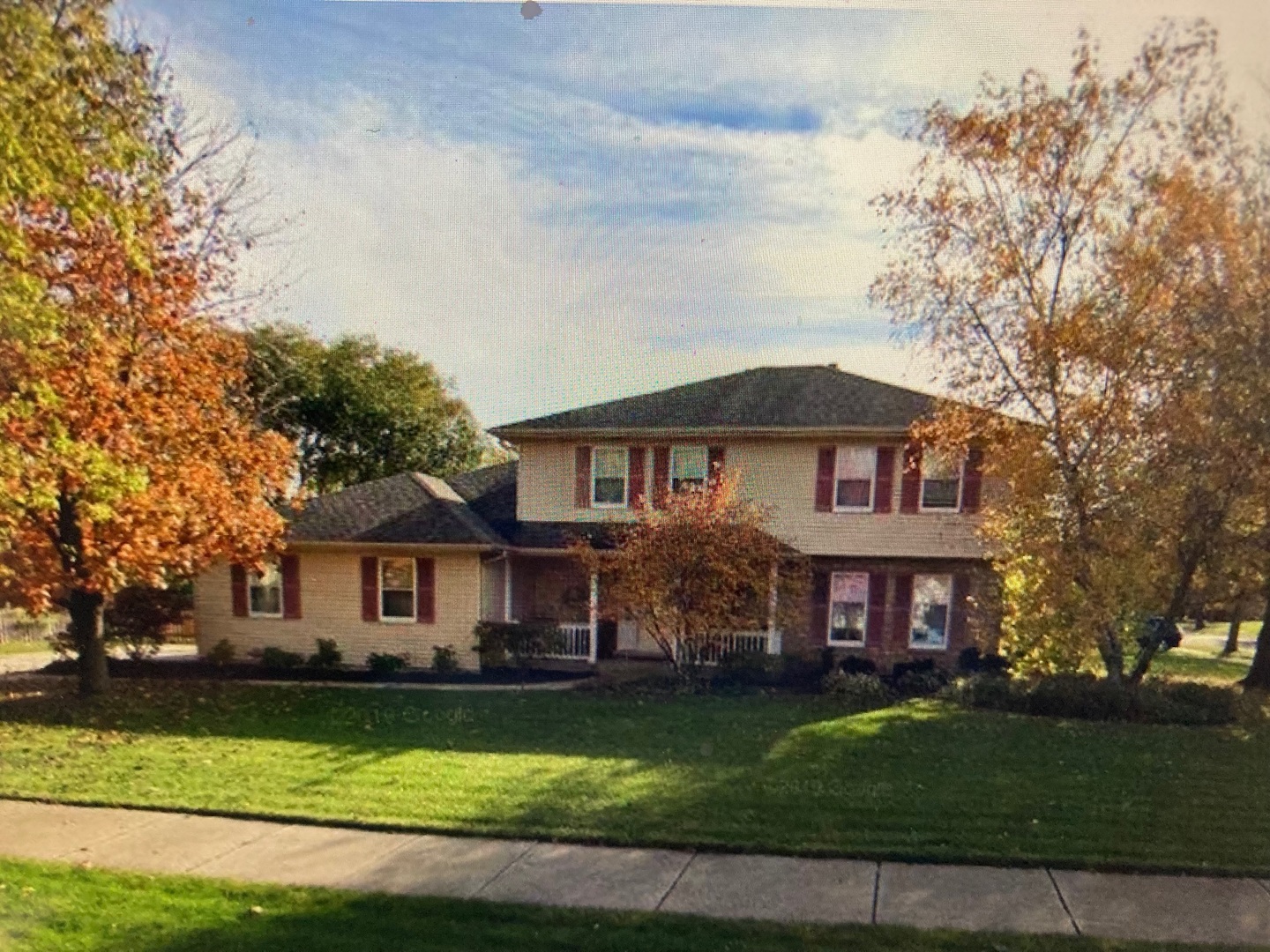36 Redstart Road Naperville, IL 60565 - Photo 1 of 38 a front view of a house with a garden