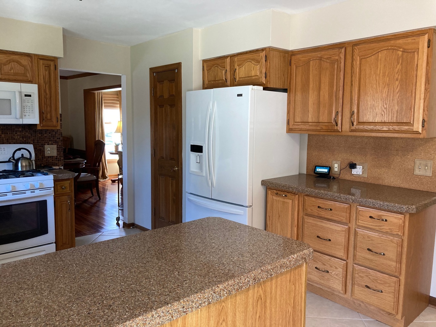 36 Redstart Road Naperville, IL 60565 - Photo 14 of 38 a kitchen with stainless steel appliances granite countertop a refrigerator sink and cabinets