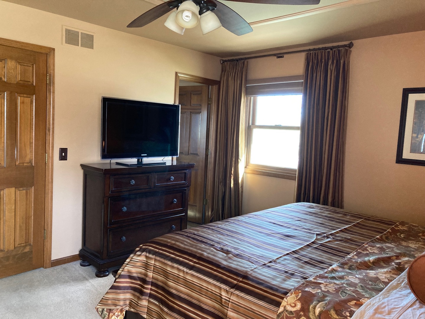 36 Redstart Road Naperville, IL 60565 - Photo 20 of 38 a bedroom with a bed and a flat screen tv