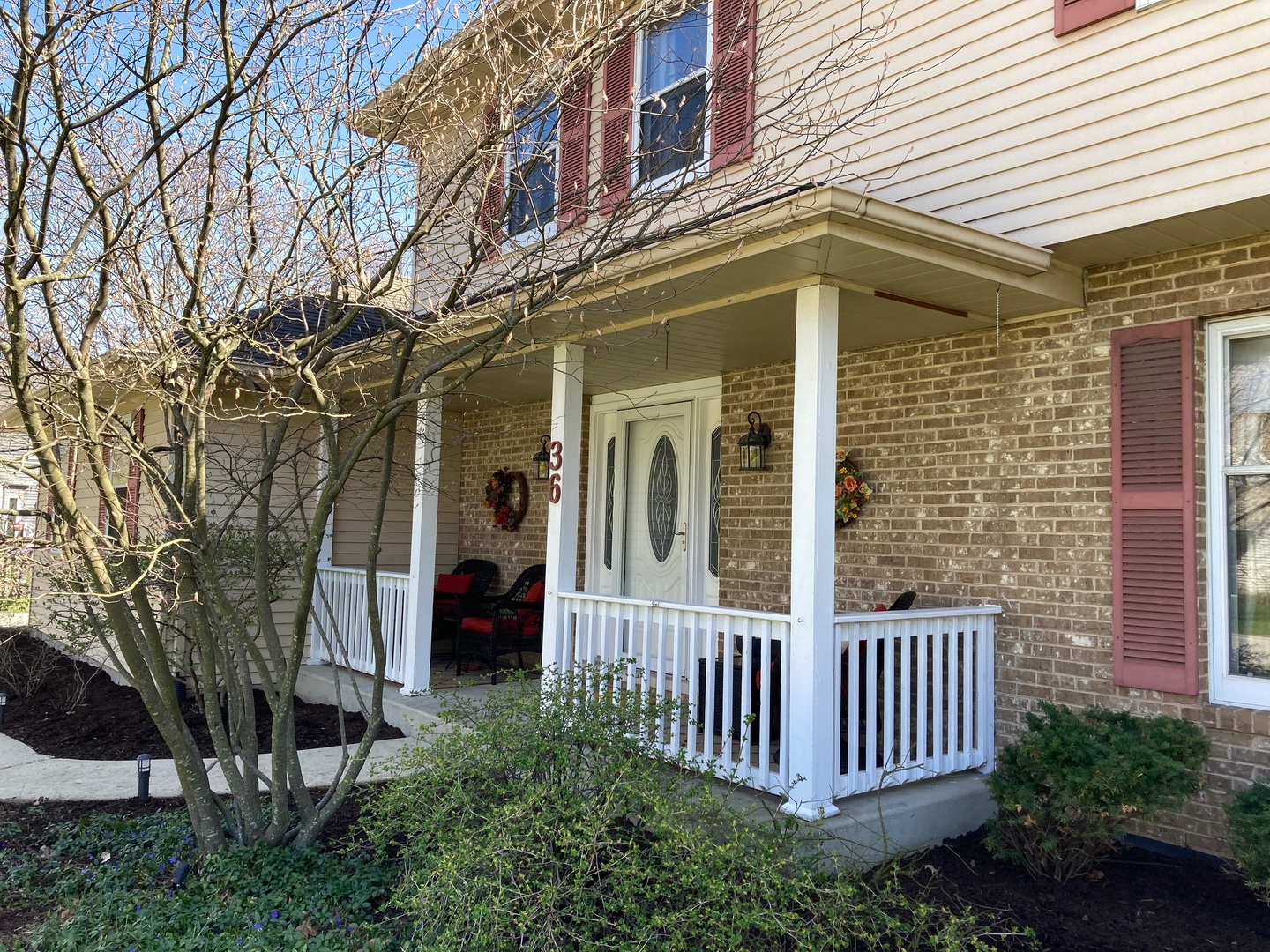 36 Redstart Road Naperville, IL 60565 - Photo 2 of 38 a front view of a house with a garden