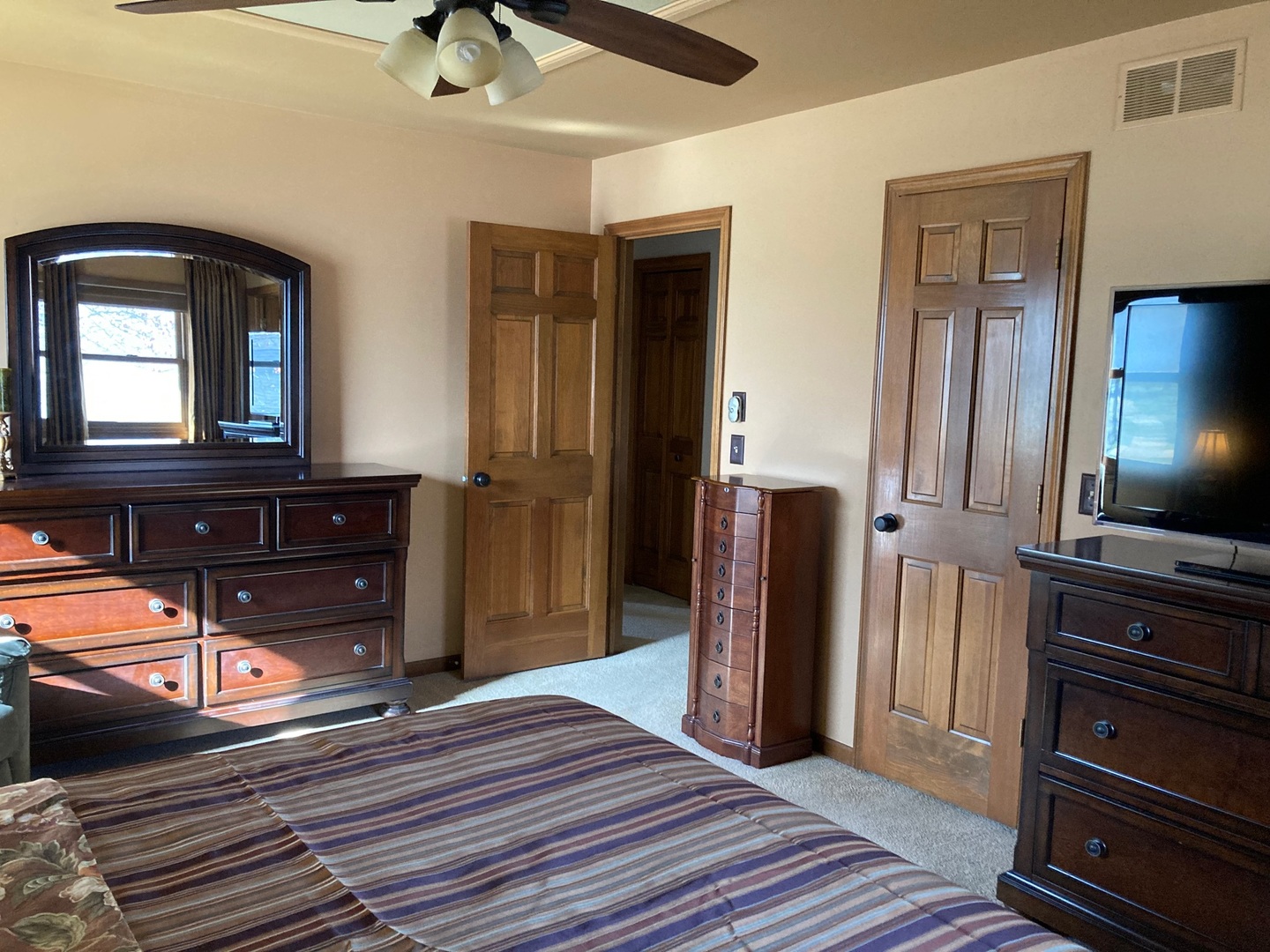 36 Redstart Road Naperville, IL 60565 - Photo 21 of 38 a view of a living room with furniture and a flat screen tv