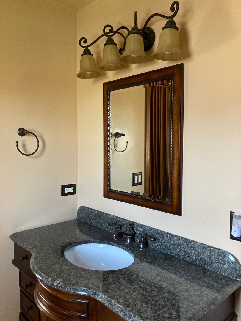 36 Redstart Road Naperville, IL 60565 - Photo 23 of 38 a bathroom with a granite countertop sink and a mirror