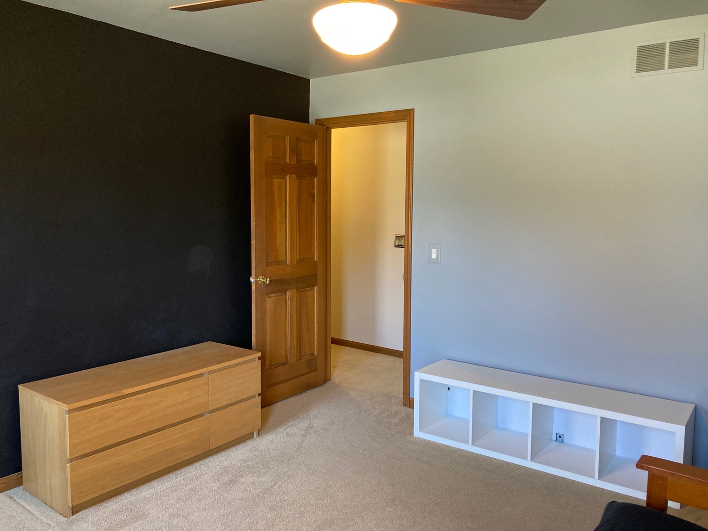 36 Redstart Road Naperville, IL 60565 - Photo 29 of 38 a view of an empty room with wooden floor and a window