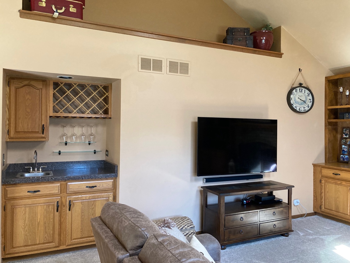36 Redstart Road Naperville, IL 60565 - Photo 8 of 38 a living room with furniture and a flat screen tv