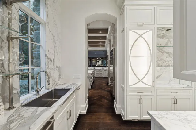 a view of a kitchen cabinets and a sink