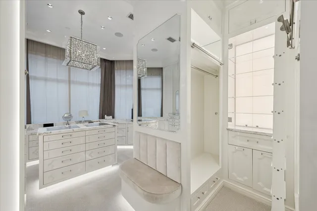 a bathroom with a double vanity sink mirror and double