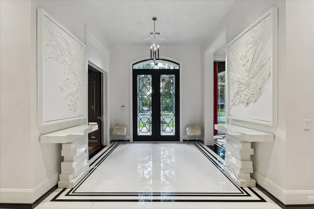 a view of a livingroom with a ceiling fan and window