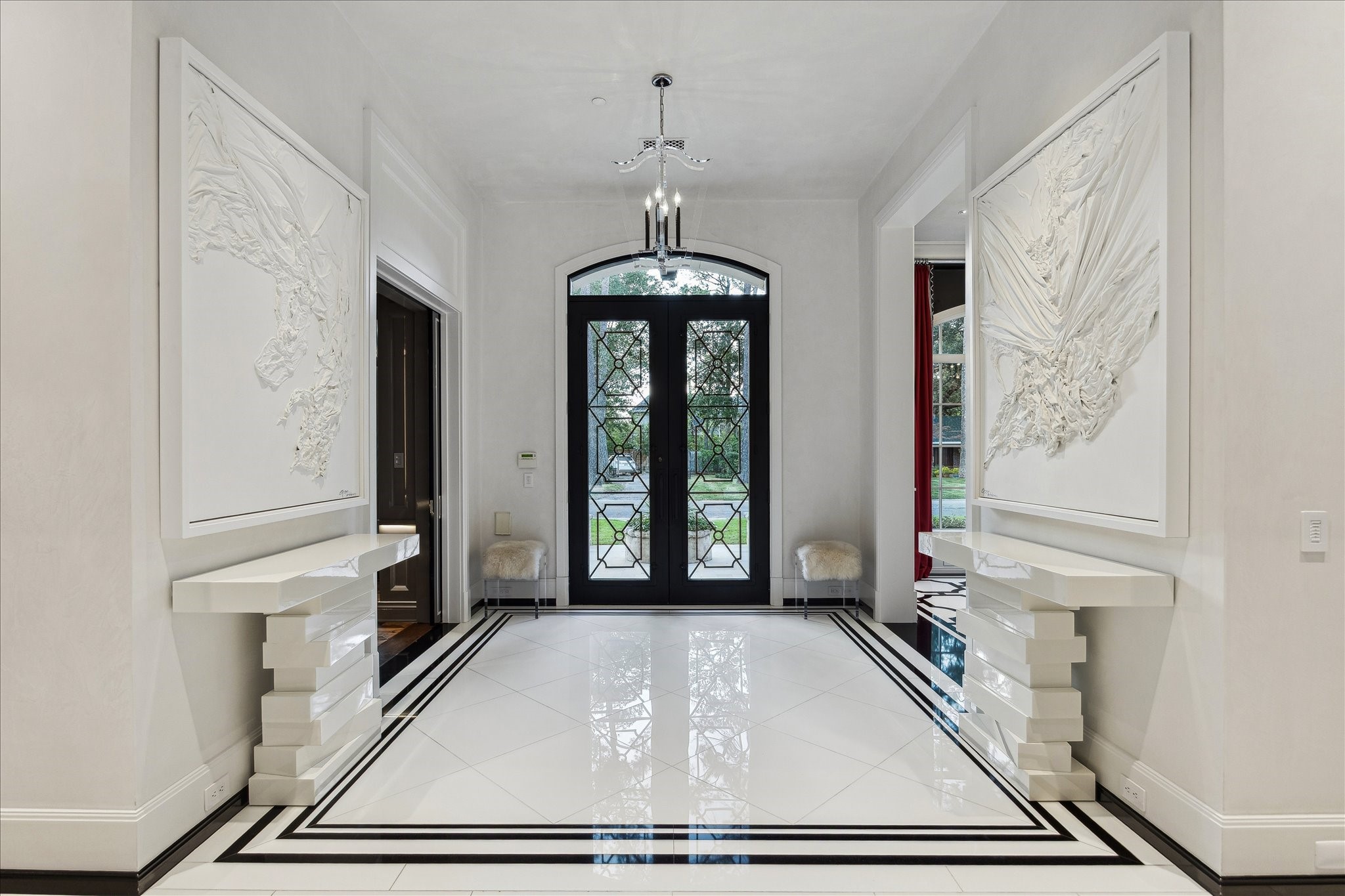 220 Merrie Way Lane Houston, TX 77024 - Photo 3 of 50 a view of a livingroom with a ceiling fan and window