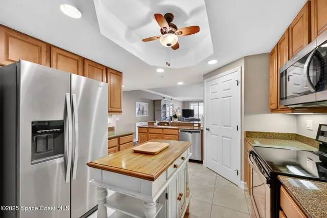 a view of balcony with furniture