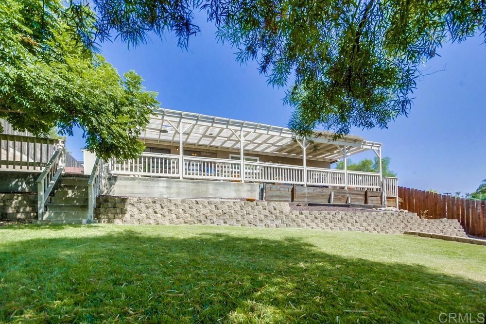 7932 Shalamar Drive El Cajon, CA 92021 - Photo 18 of 22 a view of a house with a yard