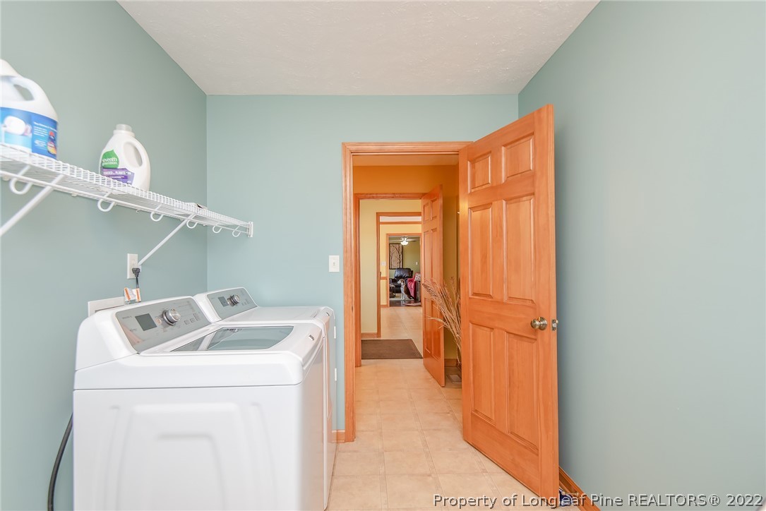 428 Rob Road Stedman, NC 28391 - Photo 27 of 45 a utility room with dryer and washer