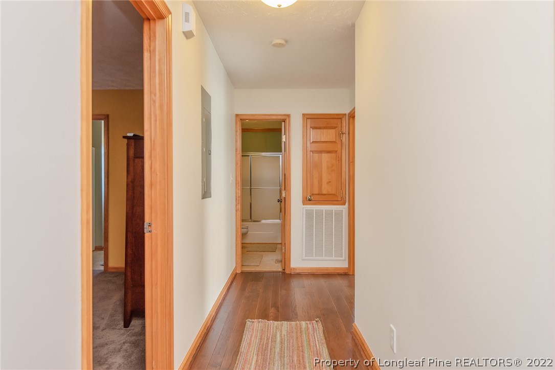 428 Rob Road Stedman, NC 28391 - Photo 30 of 45 a view of a hallway with wooden floor