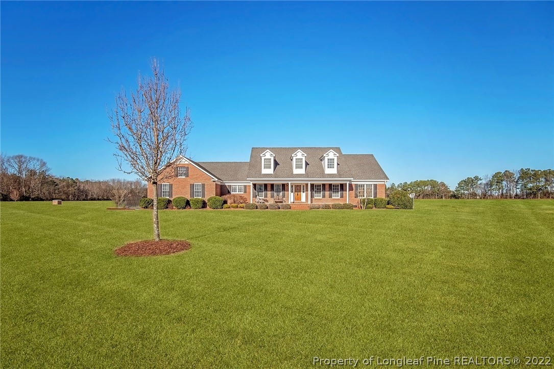 428 Rob Road Stedman, NC 28391 - Photo 4 of 45 a view of a house with a big yard