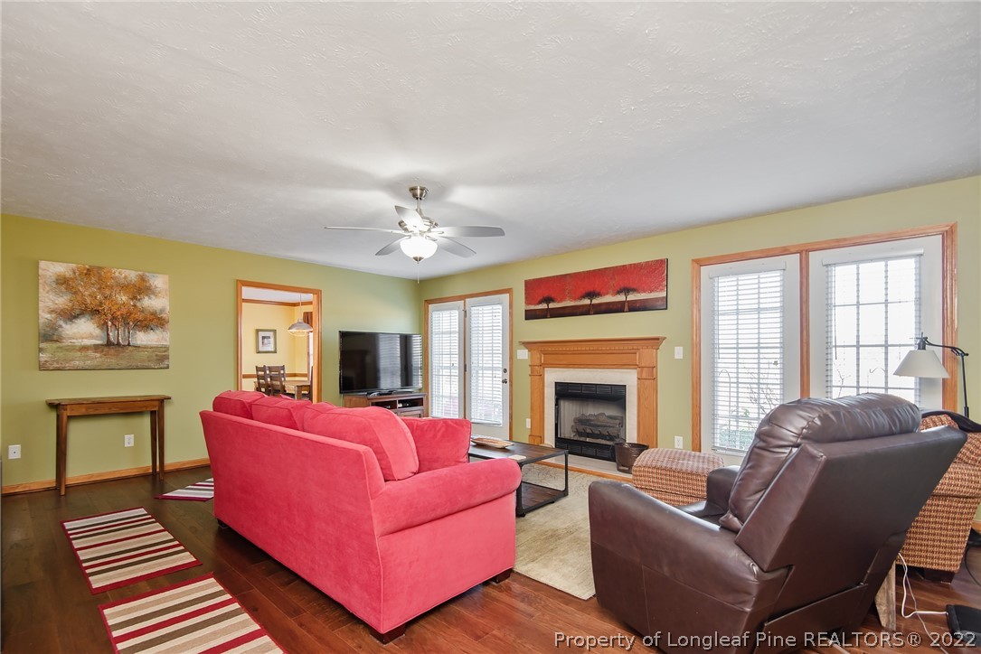 428 Rob Road Stedman, NC 28391 - Photo 8 of 45 a living room with furniture fireplace and window