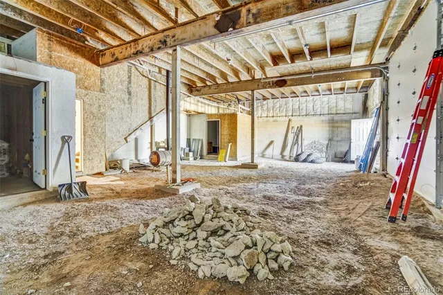 a view of a room with wooden walls