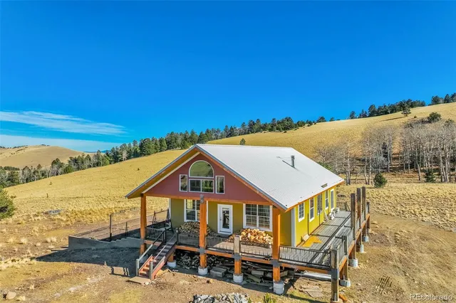 a aerial view of a house with a big yard