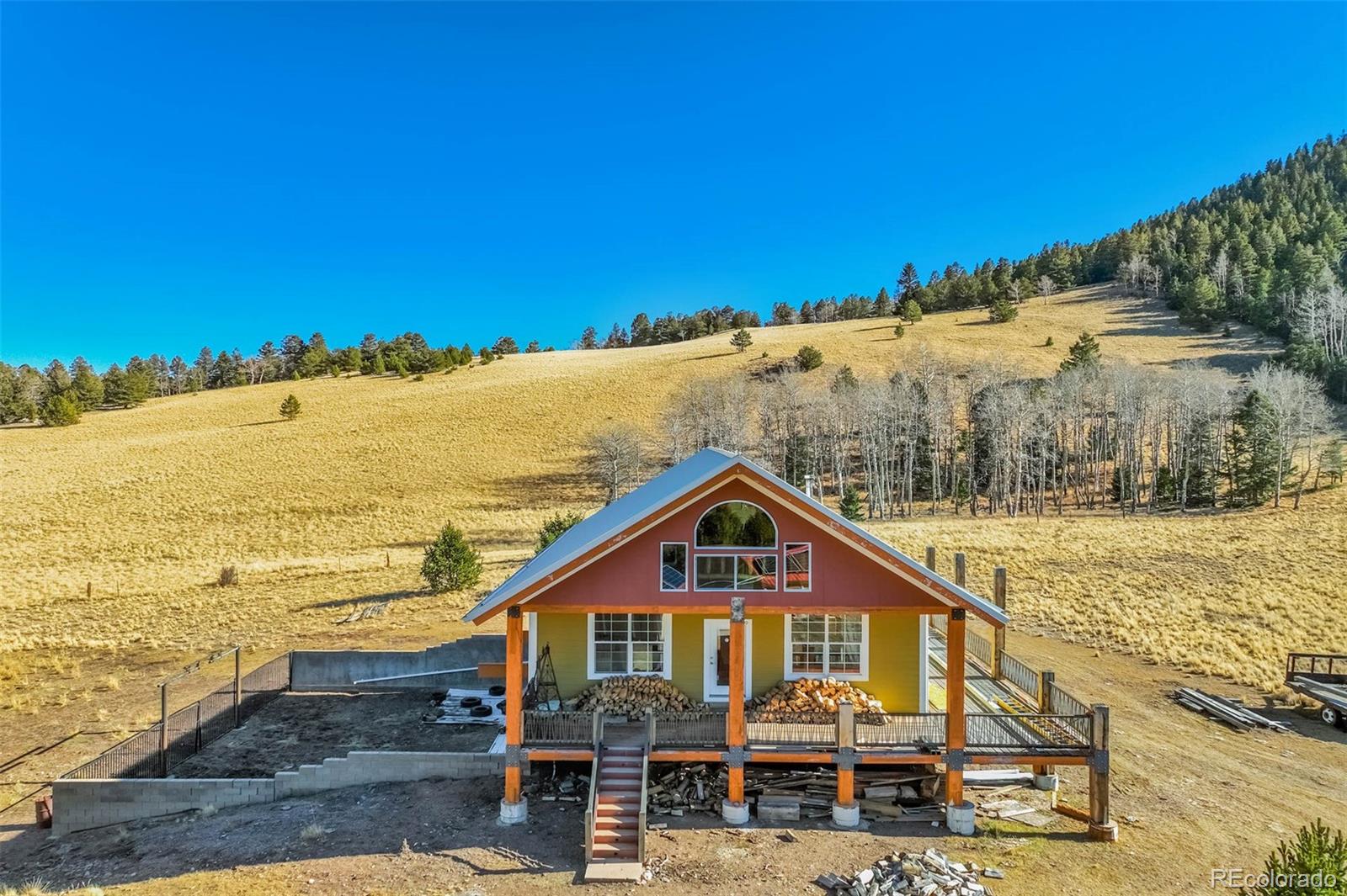 1440 North Range Road Guffey, CO 80820 - Photo 8 of 50 a view of a house with a ocean view