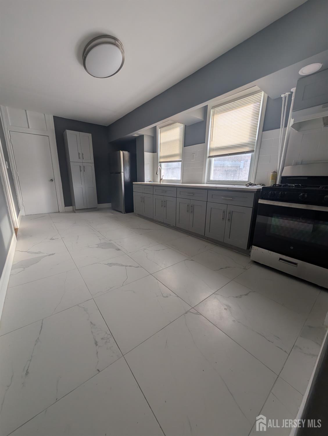 5 North 7th Street Newark, NJ 07107 - Photo 8 of 8 a view of an empty room with a window