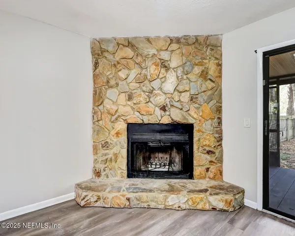 a living room with a fireplace