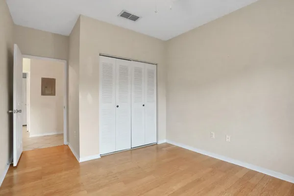 a view of a hallway with washer and dryer
