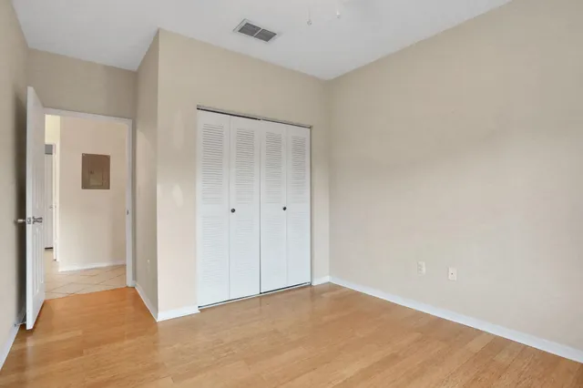 a view of a hallway with washer and dryer