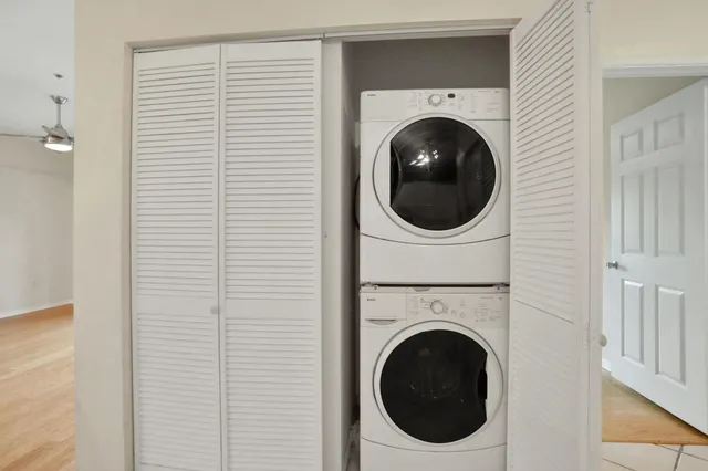 a view of a hallway with windows