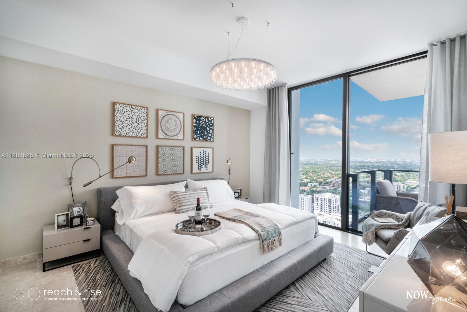88 Southwest 7th Street, Unit 2406 Miami, FL 33130 - Photo 9 of 15 a view of a dining room with furniture a chandelier and wooden floor