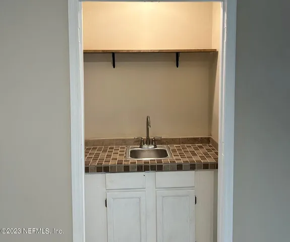 a close view of faucet in the kitchen