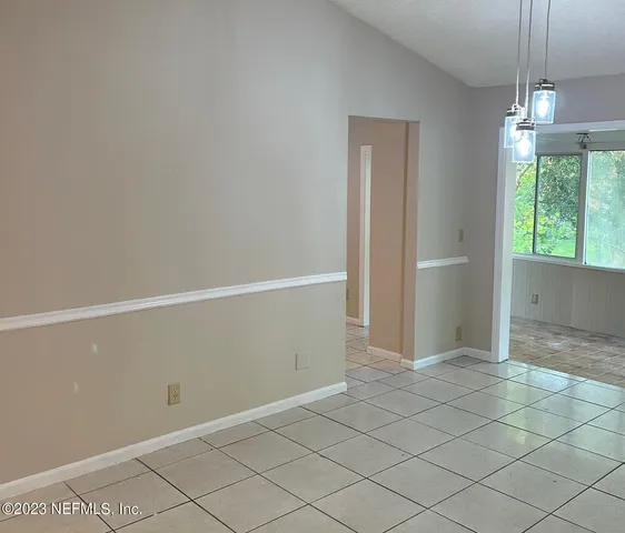 a view of an empty room and window