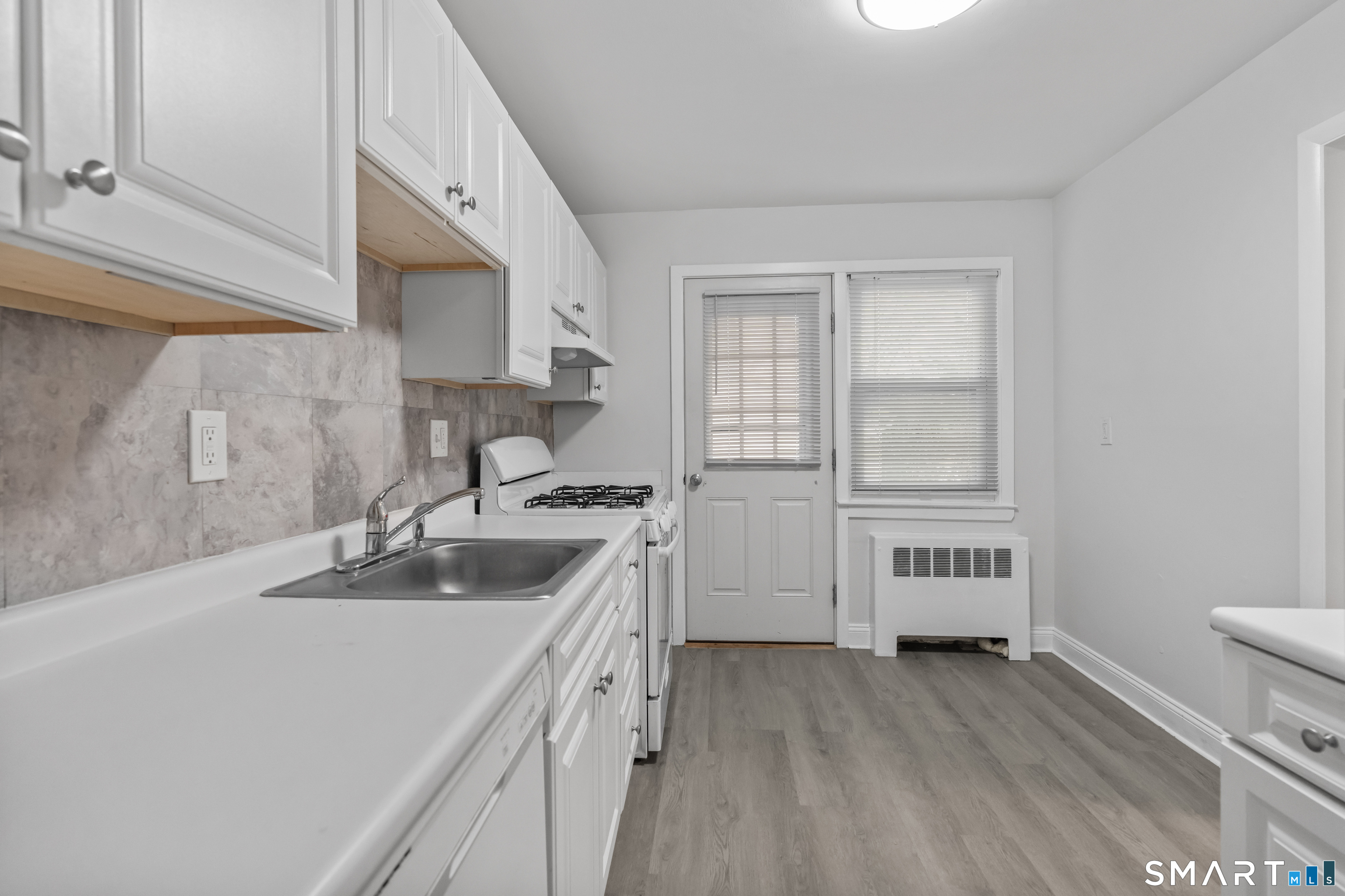 110 Blachley Road, Unit A Stamford, CT 06902 - Photo 6 of 26 Photos are of a mirror image of the unit. Finishes may vary.