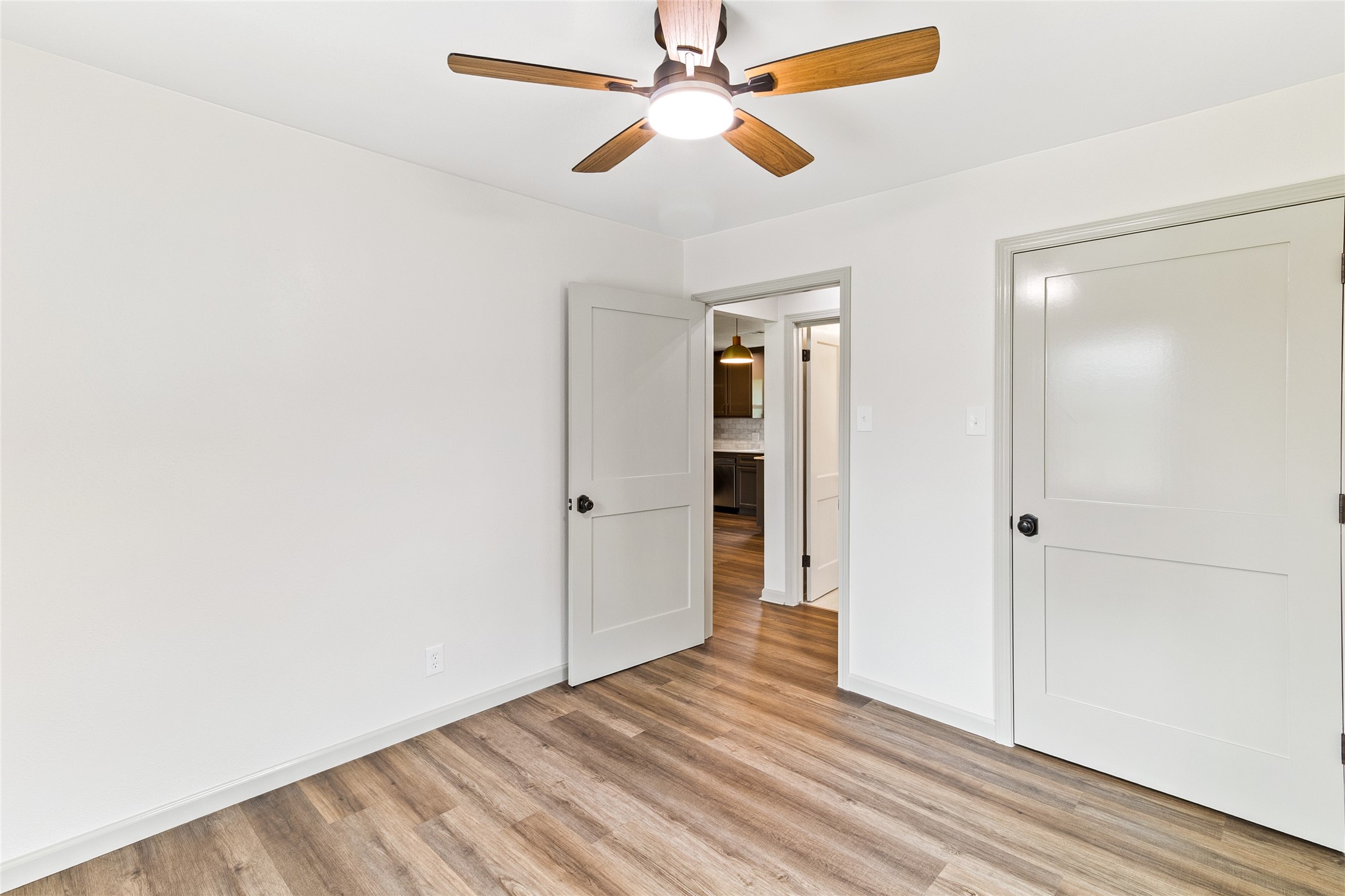 1108 Nottingham Drive Angleton, TX 77515 - Photo 17 of 23 a view of empty room with wooden floor