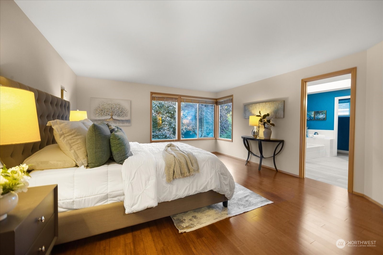 15114 92nd Place Northeast Bothell, WA 98011 - Photo 20 of 34 a bedroom with a bed and wooden floor