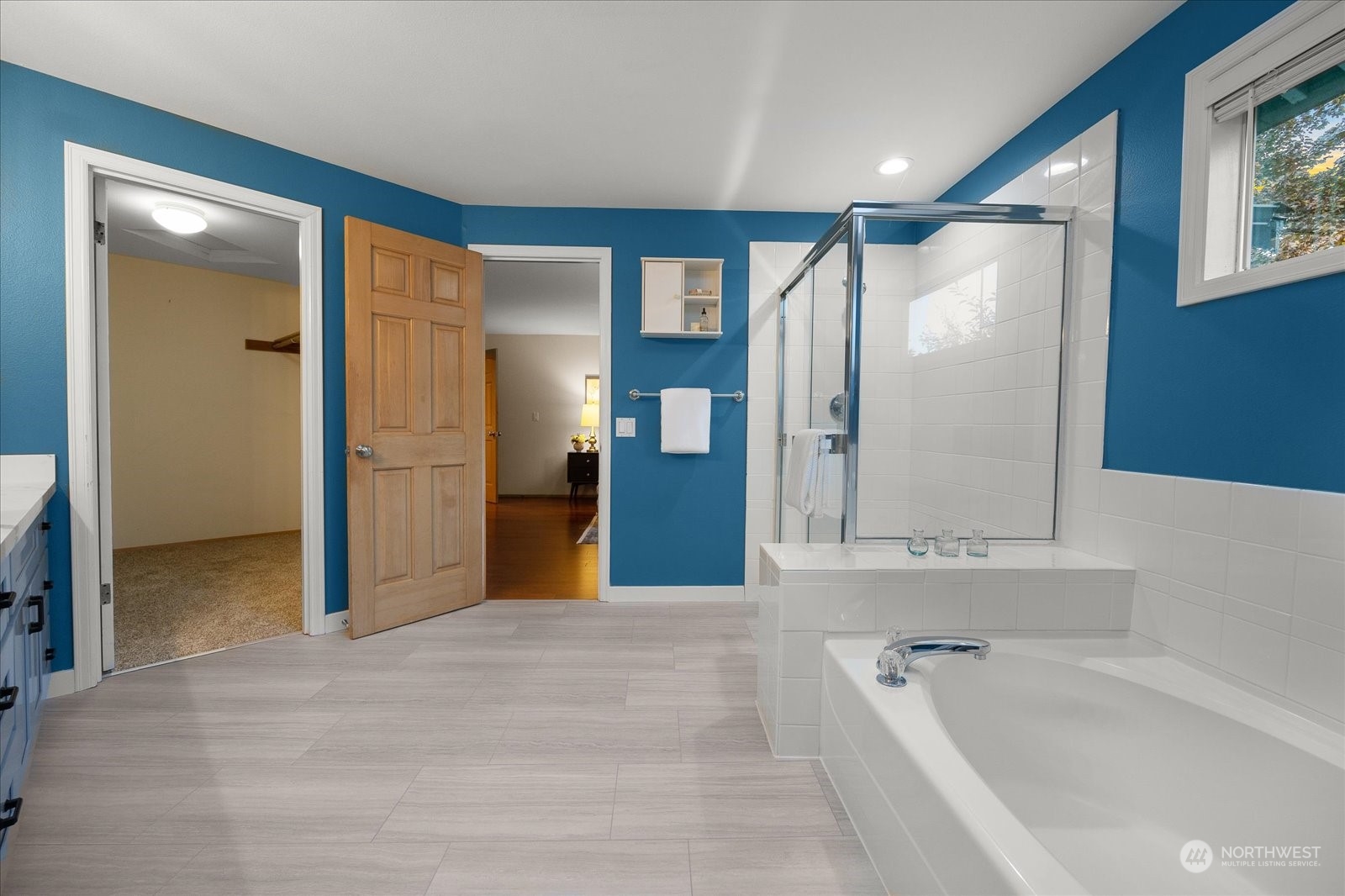 15114 92nd Place Northeast Bothell, WA 98011 - Photo 23 of 34 a bathroom with a bathtub and a shower