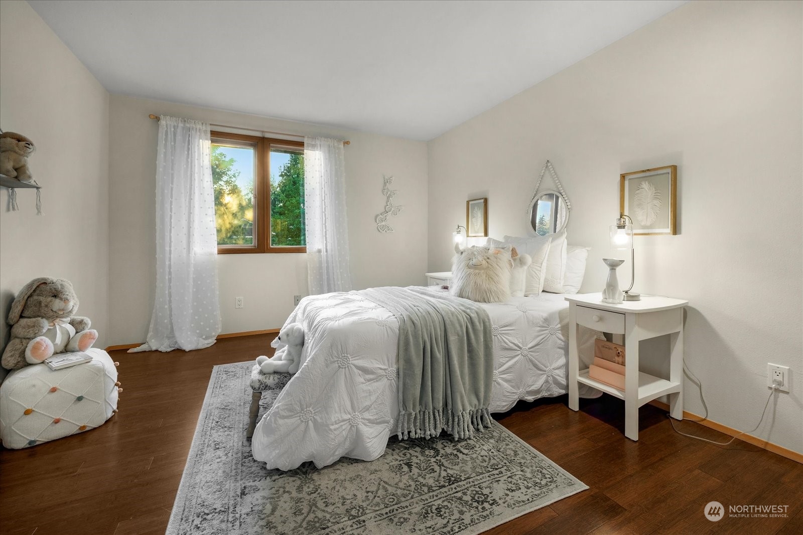 15114 92nd Place Northeast Bothell, WA 98011 - Photo 25 of 34 a bedroom with a bed and wooden floor