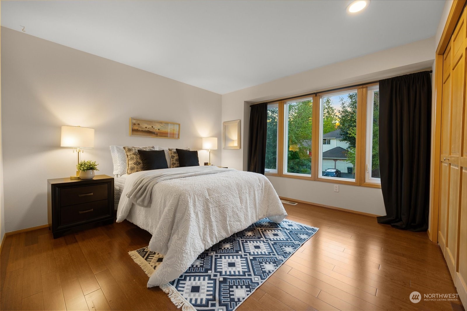 15114 92nd Place Northeast Bothell, WA 98011 - Photo 26 of 34 a bedroom with a bed and a large window