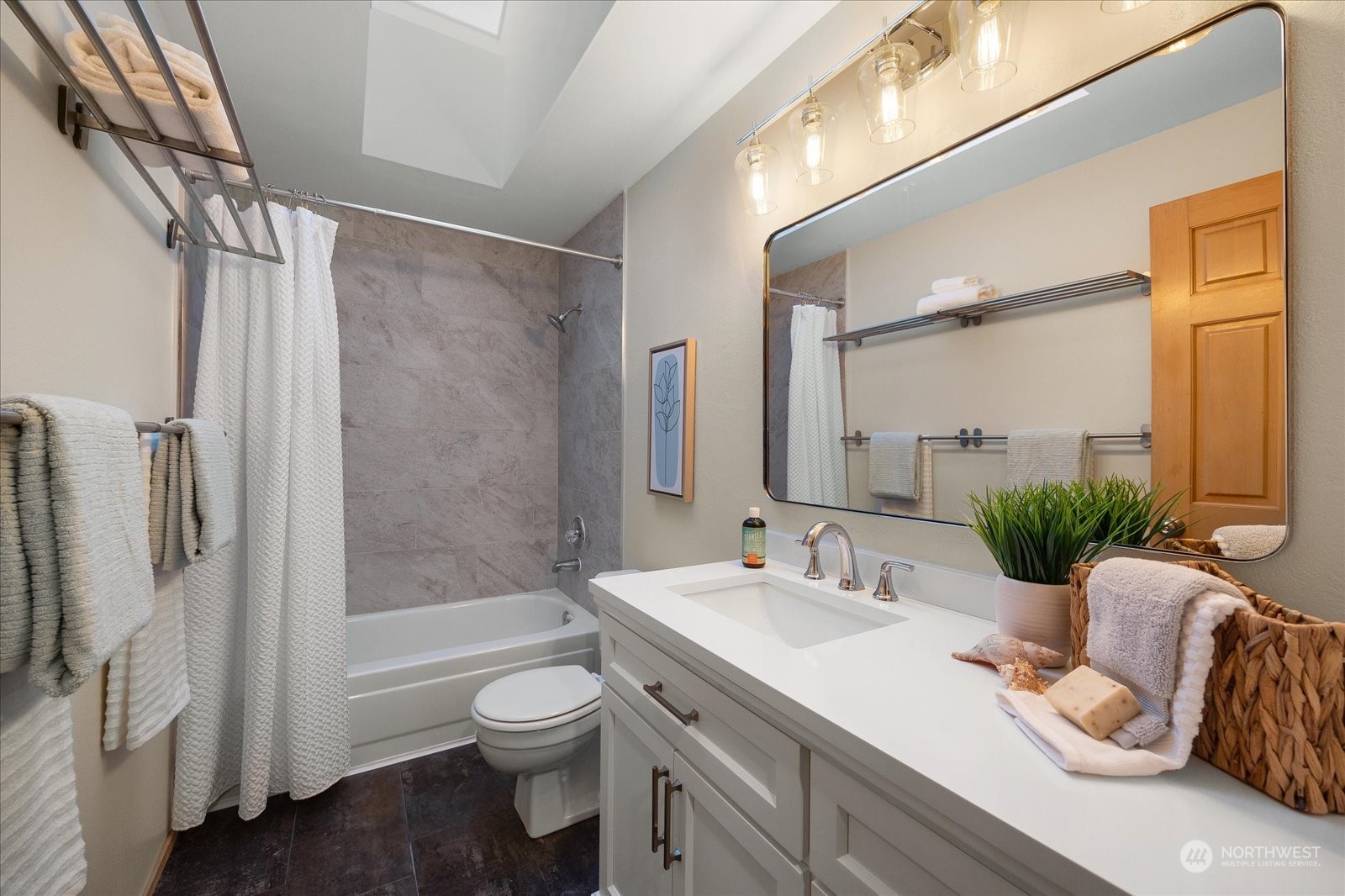 15114 92nd Place Northeast Bothell, WA 98011 - Photo 27 of 34 a bathroom with a granite countertop sink toilet and shower