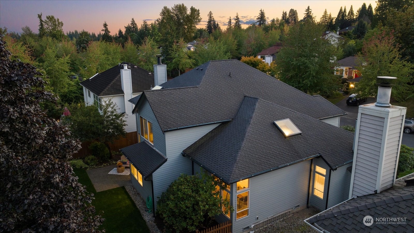 15114 92nd Place Northeast Bothell, WA 98011 - Photo 32 of 34 a view of a patio with table and chairs and potted plants