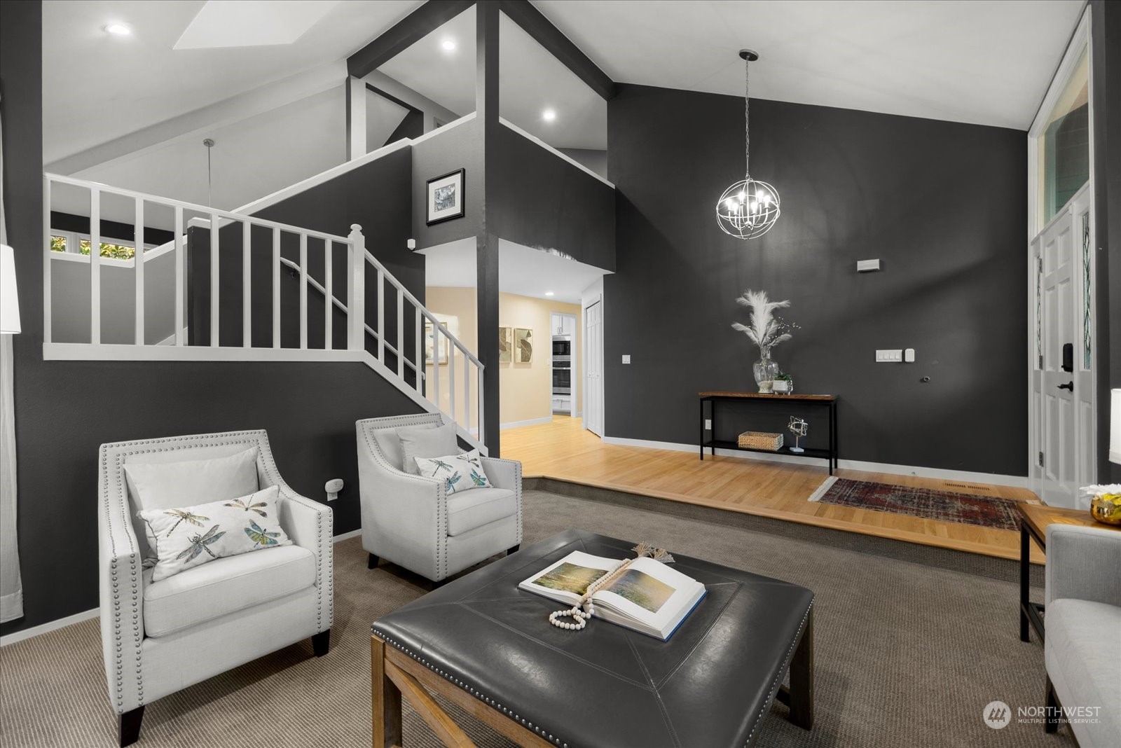 15114 92nd Place Northeast Bothell, WA 98011 - Photo 7 of 34 a living room with furniture and a chandelier