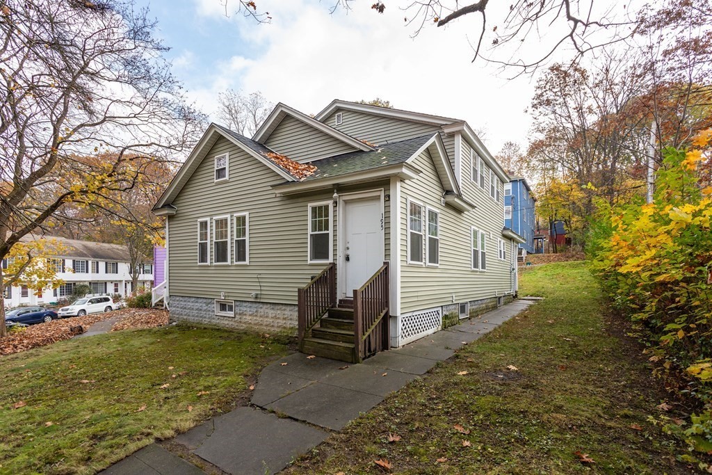 195 Eastern Avenue Worcester, MA 01605 - Photo 1 of 24 a view of a house with a yard