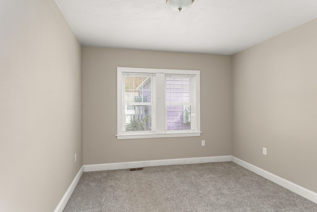 195 Eastern Avenue Worcester, MA 01605 - Photo 11 of 24 an empty room with a window