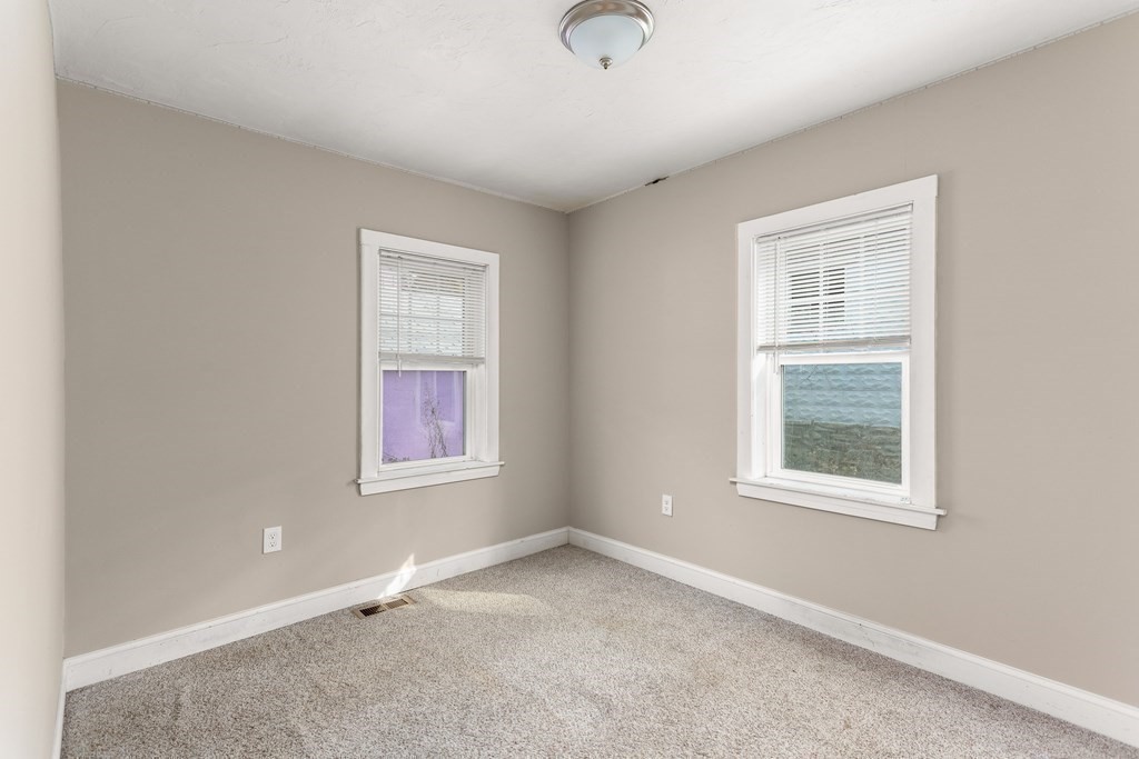 195 Eastern Avenue Worcester, MA 01605 - Photo 13 of 24 an empty room with a window