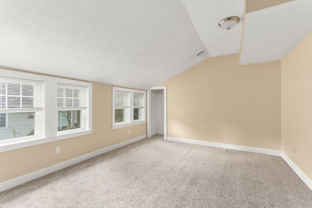 195 Eastern Avenue Worcester, MA 01605 - Photo 15 of 24 a view of an empty room with a window