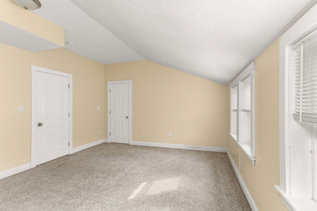 195 Eastern Avenue Worcester, MA 01605 - Photo 16 of 24 a view of an empty room with a window