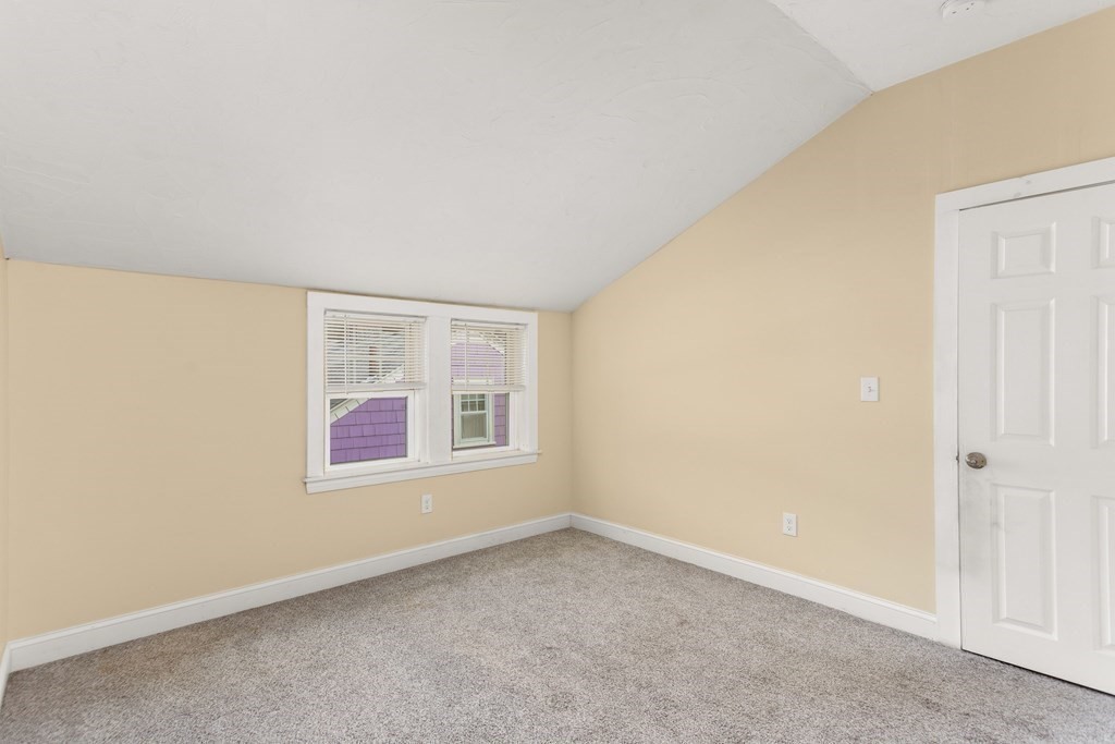 195 Eastern Avenue Worcester, MA 01605 - Photo 17 of 24 an empty room with a window