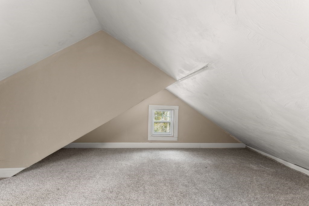 195 Eastern Avenue Worcester, MA 01605 - Photo 19 of 24 a view of a hallway with a window