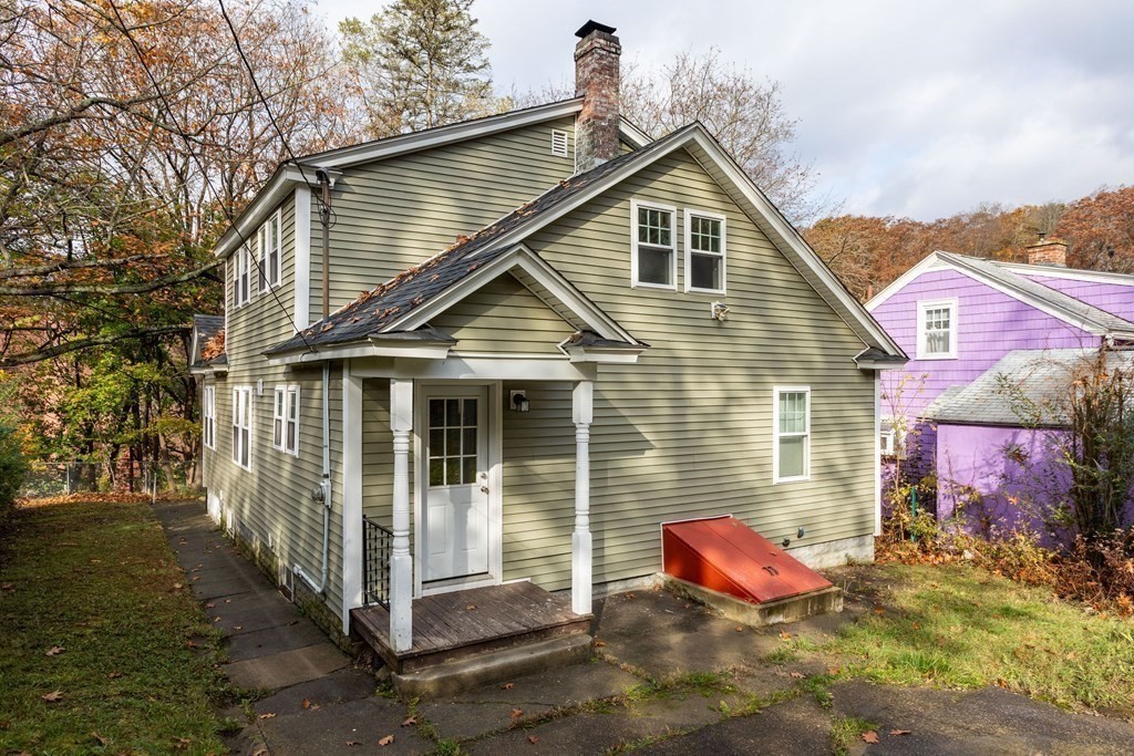 195 Eastern Avenue Worcester, MA 01605 - Photo 2 of 24 a view of a house with a yard